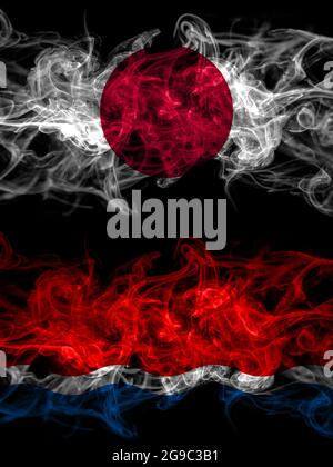 Smoke flags of Japan, Japanese and Russia, Amur Oblast Stock Photo