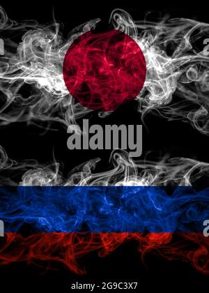 Smoke flags of Japan, Japanese and Russia, Russian Stock Photo