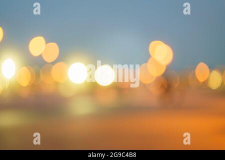 Abstract background with bokeh light of night lights, car headlights, evening lights of big city Stock Photo