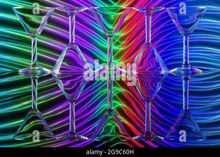 Composition Of Glasses On Colorful Background Stock Photo