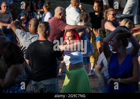 People dancing salsa at Oopperan amfiteatteri in Taka-Töölö district of Helsinki, Finland Stock Photo