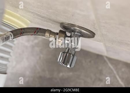 Toilet pipe repair concept background close-up to toilet equipment, pipeline system Stock Photo