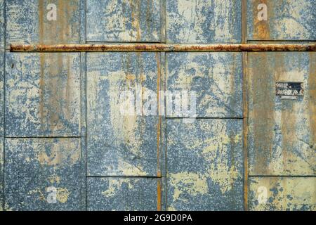 Rusted metal surface with peeling paint Stock Photo