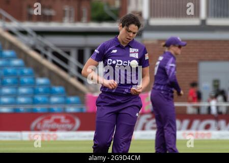 Leeds, England, 24 July 2021. Alice Davidson-Richards of Northern Superchargers tossing the ball from hand to hand as she prepares to bowl against Welsh Fire during their match in The Hundred Women’s Competition at Headingley. Stock Photo
