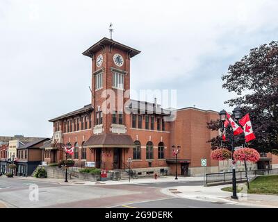Post office building with clock tower (1914). Colonial-style architecture building in the historic district of Newmarket city in Ontario, Canada. The Stock Photo