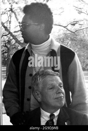 May 24, 1969, Lake Forest, Illinois, USA: African-American students from the newly-formed BSBA (Black Students for Black Action) group, including CHARLES WEBB, interrupt a Parents Weekend dinner at Lake Forest College in Lake Forest, Illinois, Saturday May 24, 1969. WEBB stands behind college PRESIDENT WILLIAM GRAHAM COLE who was seated at the head table. (Credit Image: © Mark Hertzberg/ZUMA Press Wire) Stock Photo