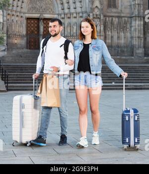 Couple going the historic city center Stock Photo