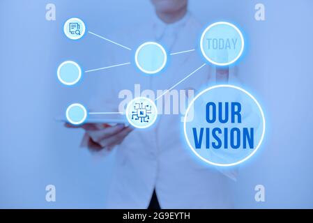 Sign displaying Our Vision. Business showcase an aspirational description of what an organization like to achieve Lady Holding Tablet Pressing On Stock Photo