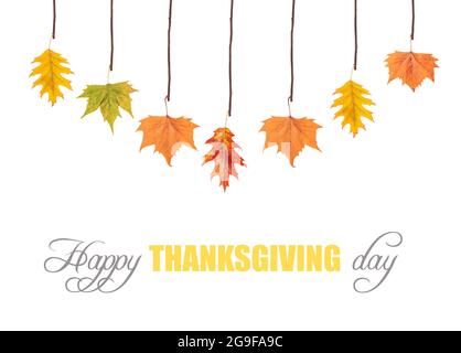 Happy thanksgiving and leaves hanging on tree branch Stock Photo