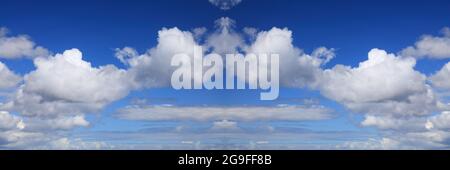 Panoramic sky background. White clouds blue sky background. White cumulus clouds texture. Stock Photo