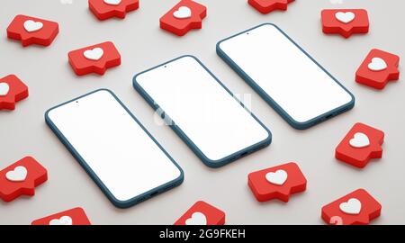 Three blank screen phone mockup surrounded by social media likes. Smartphone display with social network heart button, realistic presentation template Stock Photo