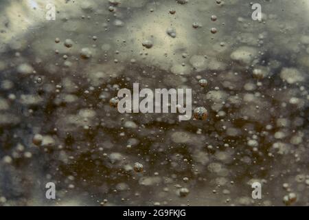 Close up of transparent gel with bubbles. Background from texture liquid gel cream. Stock Photo