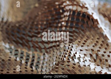 Abstract background with perforated wrapping paper Stock Photo