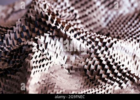 Abstract background with perforated wrapping paper Stock Photo