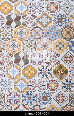 Mosaic ceramic tile, colorful wall texture, abstract pattern, design element. Vintage tile background. Azulejo ornament, floor surface. Tiled backdrop Stock Photo