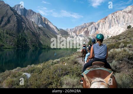 You can ride a horse at the pack station by Convict Lake in Mono County, CA, USA, which gives you wonderful views of the mountains. Stock Photo