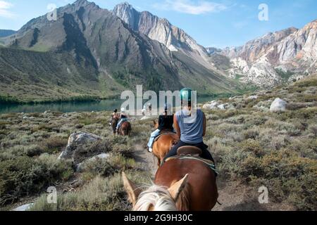 You can ride a horse at the pack station by Convict Lake in Mono County, CA, USA, which gives you wonderful views of the mountains. Stock Photo