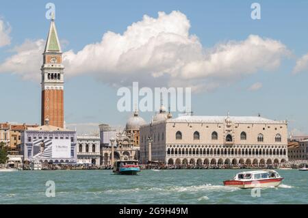 VENICE, ITALY - MAY 18, 2013: The Campanile of the Basilica San Marco and the Palazzo Ducale in Venice, Italy, seen from the Canale della Giudecca. Stock Photo