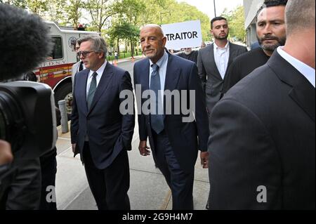 New York City, USA. 26th July, 2021. Private Equity investor and Chair of the Trump 2016 Inauguration Committee Thomas Barrack (center) is seen arriving at the Brooklyn Federal Court after posting $250 secured million bond, in the Brooklyn borough of New York City, NY, July 26, 2021. Barrack, close of ally of former President Donald Trump, is accused of not registering as a foreign agent, advancing United Arab Emirates interest and influencing foreign policy positions of Trump's 2016 campaign. (Anthony Behar/Sipa USA) Credit: Sipa USA/Alamy Live News Stock Photo