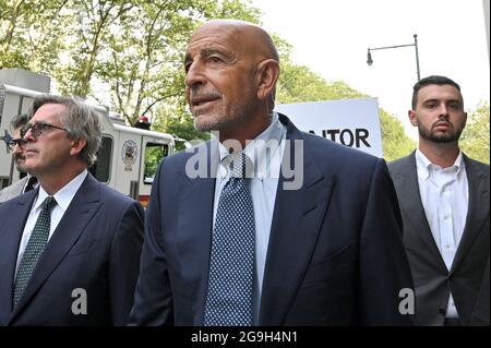 New York City, USA. 26th July, 2021. Private Equity investor and Chair of the Trump 2016 Inauguration Committee Thomas Barrack (center) is seen arriving at the Brooklyn Federal Court after posting $250 secured million bond, in the Brooklyn borough of New York City, NY, July 26, 2021. Barrack, close of ally of former President Donald Trump, is accused of not registering as a foreign agent, advancing United Arab Emirates interest and influencing foreign policy positions of Trump's 2016 campaign. (Anthony Behar/Sipa USA) Credit: Sipa USA/Alamy Live News Stock Photo