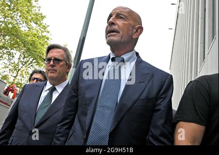 New York City, USA. 26th July, 2021. Private Equity investor and Chair of the Trump 2016 Inauguration Committee Thomas Barrack (center) is seen arriving at the Brooklyn Federal Court after posting $250 secured million bond, in the Brooklyn borough of New York City, NY, July 26, 2021. Barrack, close of ally of former President Donald Trump, is accused of not registering as a foreign agent, advancing United Arab Emirates interest and influencing foreign policy positions of Trump's 2016 campaign. (Anthony Behar/Sipa USA) Credit: Sipa USA/Alamy Live News Stock Photo