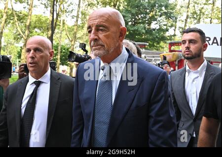 New York City, USA. 26th July, 2021. Private Equity investor and Chair of the Trump 2016 Inauguration Committee Thomas Barrack (center) is seen arriving at the Brooklyn Federal Court after posting $250 secured million bond, in the Brooklyn borough of New York City, NY, July 26, 2021. Barrack, close of ally of former President Donald Trump, is accused of not registering as a foreign agent, advancing United Arab Emirates interest and influencing foreign policy positions of Trump's 2016 campaign. (Anthony Behar/Sipa USA) Credit: Sipa USA/Alamy Live News Stock Photo