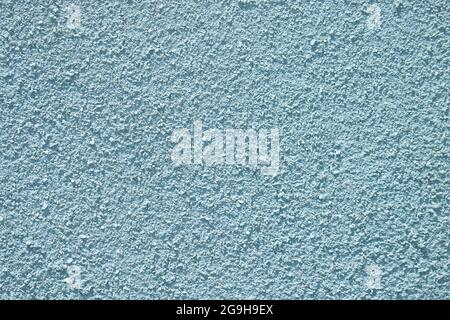 Texture of blue rough grained plaster abstract background. Stock Photo