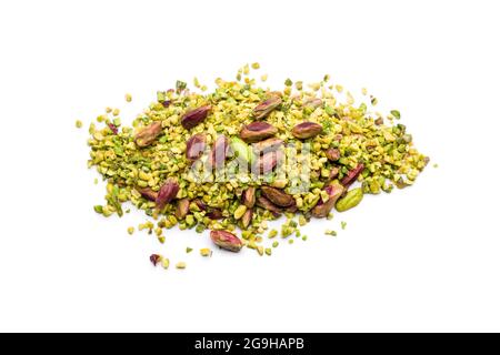 Chopped and peeled pistachios bunch on white background Stock Photo