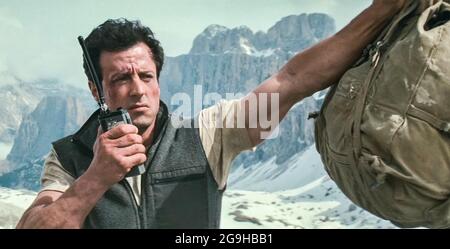 USA. Sylvester Stallone in a scene from the (C)TriStar Pictures movie: Cliffhanger (1993) . Plot: A botched mid-air heist results in suitcases full of cash being searched for by various groups throughout the Rocky Mountains. Ref: LMK110-J7244-260721  Supplied by LMKMEDIA. Editorial Only. Landmark Media is not the copyright owner of these Film or TV stills but provides a service only for recognised Media outlets. pictures@lmkmedia.com
