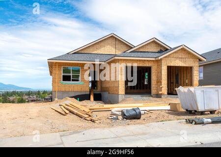 A hilltop new construction home being built in the mountains of Liberty Lake, Washington, USA, a suburb of the city of Spokane. Stock Photo