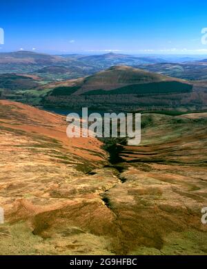 View across Talybont Reservoir from the summit of Waun Rydd looking towards Tor Y Foel, Brecon Beacons National Park, Powys, Wales. Stock Photo