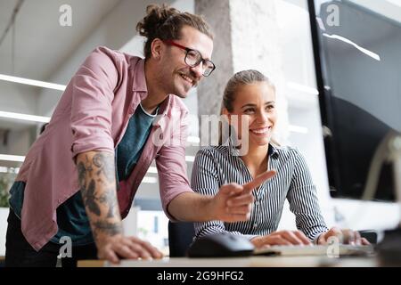 Creative managers crew working with new startup project in office. Team brainstorming. Stock Photo