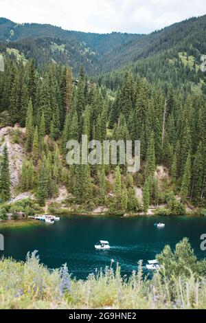 Kaindy Lake in the Tien Shan Mountains, sunken forest Stock Photo