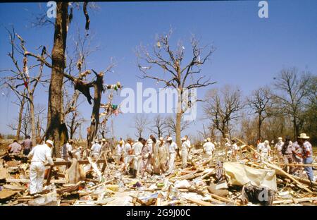 Brenham Texas USA, April 71992:  Rescuers pick through rubble after a natural gas pipeline explosion leveled a rural area outside of Brenham, killing one person and several cattle, and injuring a score of people. ©Bob Daemmrich Stock Photo