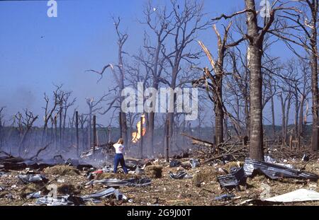 Brenham Texas USA, April 71992:  Resident surveys rubble after a natural gas pipeline explosion leveled a rural area outside of Brenham, killing one person and several cattle, and injuring a score of people. ©Bob Daemmrich Stock Photo