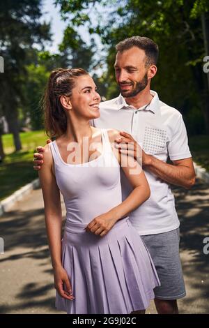 Happy young woman smiling at her boyfriend Stock Photo
