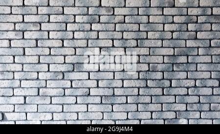 Modern white with gray brick wall texture for background. Abstract weathered texture painted with old stucco light gray and aged paint white brick wal Stock Photo