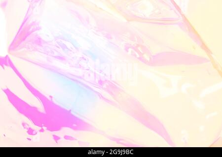 Blurred colorful holographic background. Defocused textured gradient in pastel colors. Stock Photo