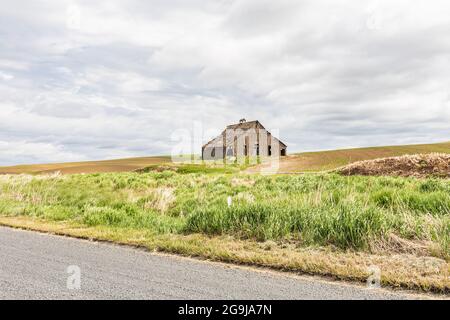 Garfield, Washington, USA. May 24, 2021. An old abandoned barn in the Palouse hills. Stock Photo