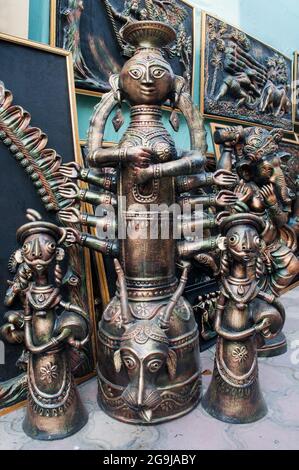 KOLKATA, WEST BENGAL , INDIA - DECEMBER 14TH 2013 : An handicraft artwork of Debi Durga, Hindu Goddess, with her daughters on display during the Handi Stock Photo