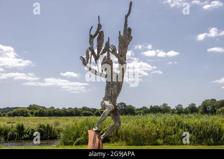 Icarus Fell (Amid Feathers) by Nicola Godden, Sculpture by the Lakes, Pallington, Dorchester, Dorset Stock Photo