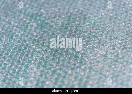 Page of Large Clear Bubbles on bubblewrap packaging material. Packaging with air bubbles - blue texture. Stock Photo