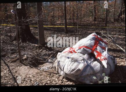 Texas Accidents & Disasters:  ©2003 Pieces of the Columbia Shuttle nose cone near Hemphill, Texas as debris scattered throughout east Texas in the aftermath of the Space Shuttle Columbia disaster that broke up over east Texas in February, 2003. Stock Photo