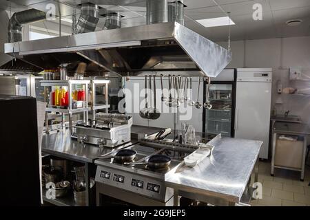 Professional kitchen in restaurant. Modern equipment and devices. Empty kitchen Stock Photo