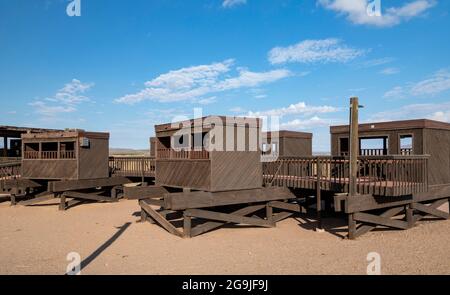 La Joya, New Mexico - Picnic shelters at an Interstate 25 rest area offer shelter from the hot sun in the New Mexico desert.