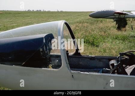 Pilot prepares for flight and checks the aerometric instruments altimeter artificial horizon heading indicator airspeed indicator, variometer. Glider Stock Photo