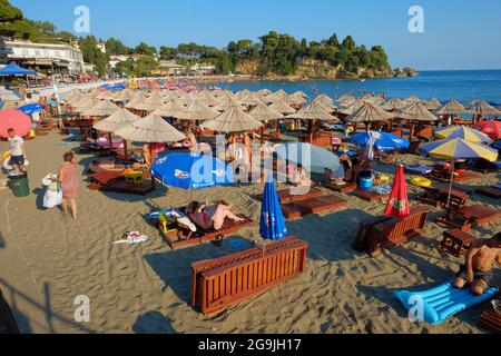 ULCINJ, MONTENEGRO - JULY 10, 2015: crowded 'Mala Plaza' colorful beach along  the small bay in Ulcinj, Montenegro Stock Photo