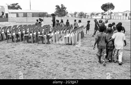 JOHANNESBURG, SOUTH AFRICA - Jan 05, 2021: African Children attending an outside preschool classroom in Johannesburg, South Africa Stock Photo