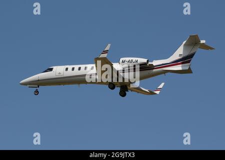M-ABJA, a Learjet 45 operated by Aviation Leasing (IOM), on approach to Prestwick International Airport in Ayrshire, Scotland. Stock Photo