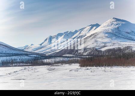 Snow covered Suntar-Khayata mountain Range, Road of Bones, Sakha Republic, Yakutia, Russia Stock Photo